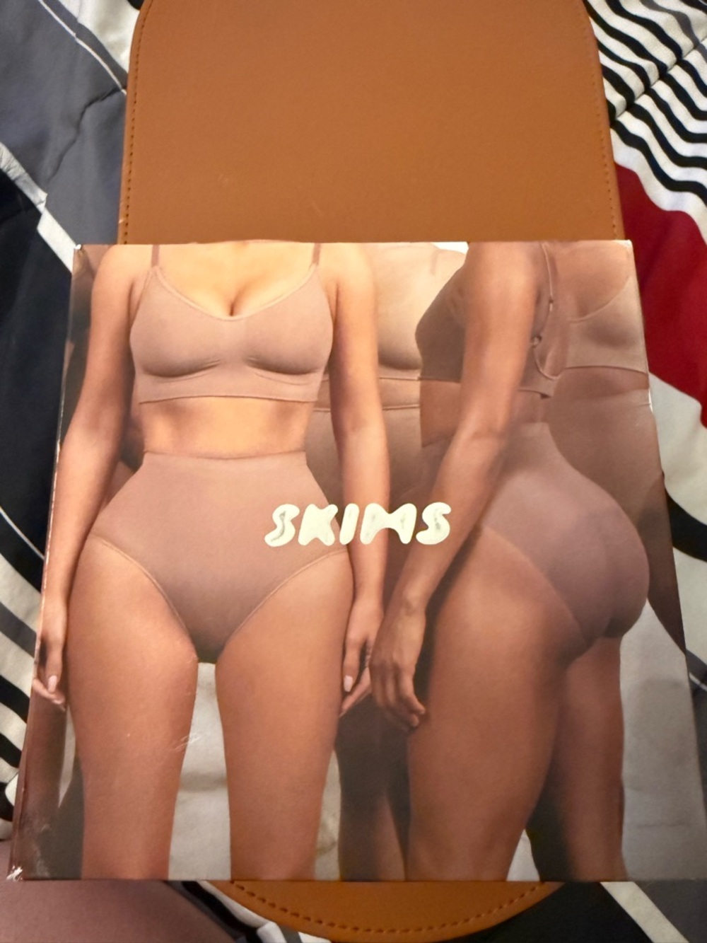 SKIMS Sculpting Mid-Waist Thong in Sand
